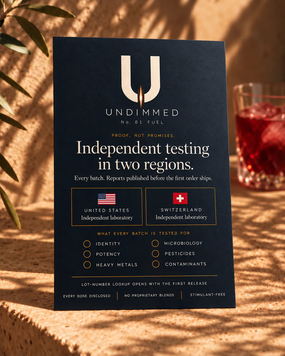 UNDIMMED card on travertine stating independent testing in the United States and Switzerland, with reports published before the first order ships.